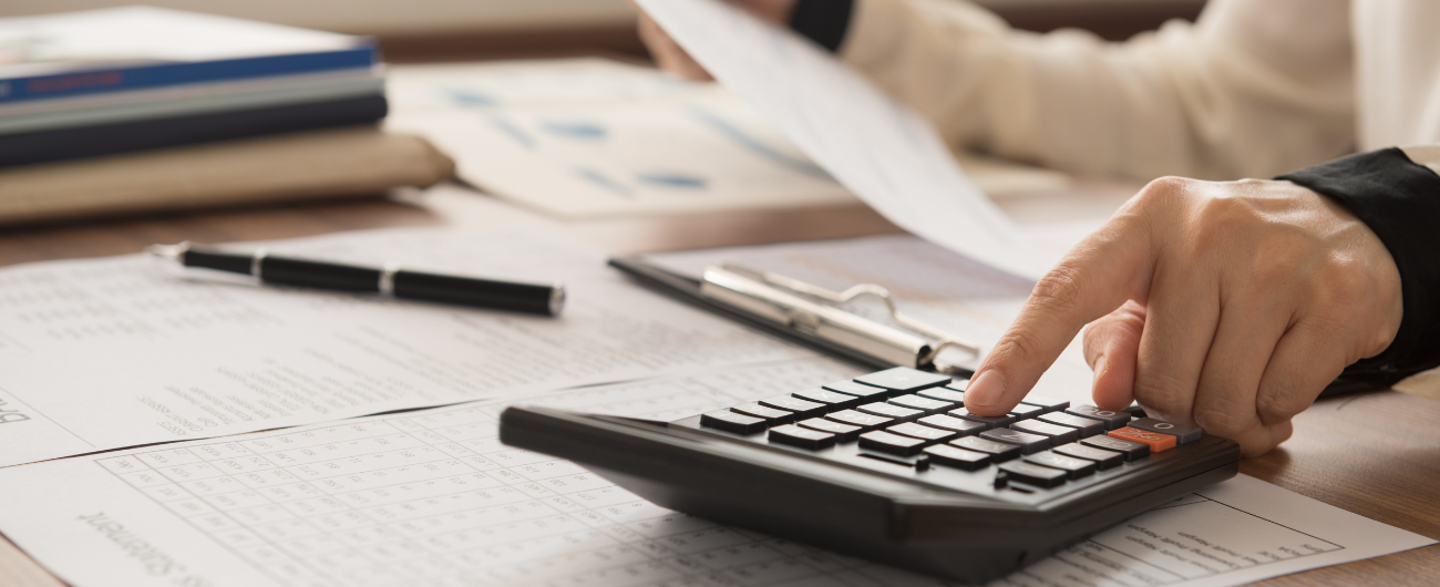 a representative image of a person calculating their finanaces.